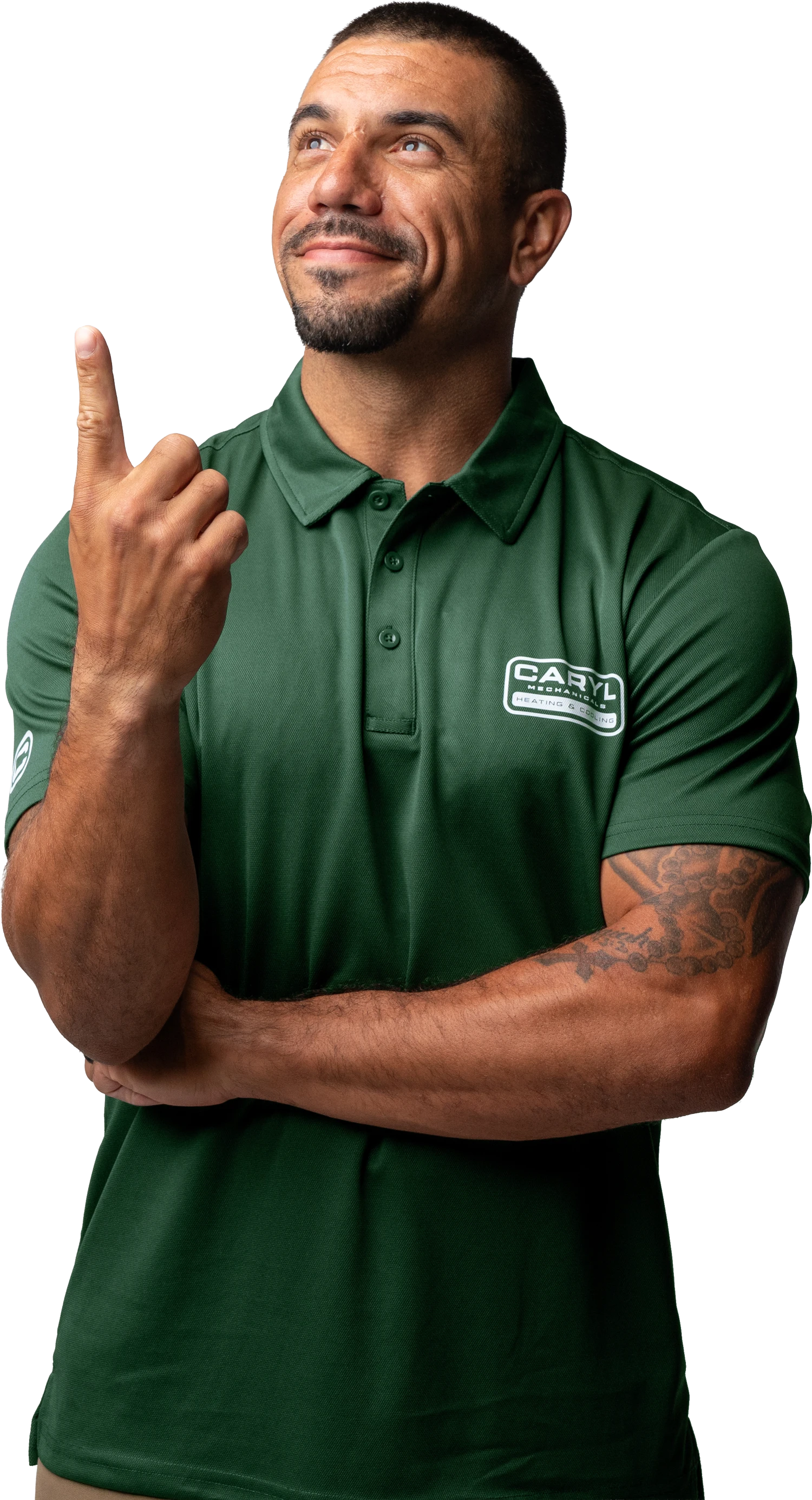 A person in a green Caryl Services polo shirt stands with one arm crossed and points upward with the other hand, looking up and smiling.
